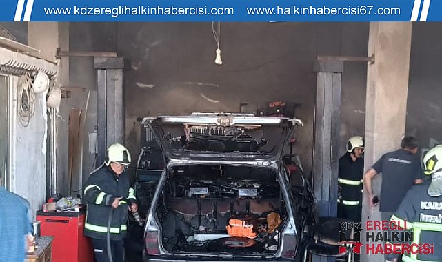 Hurda dükkanında çıkan yangında otomobil kül oldu