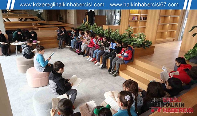 Öğrencilerden kütüphanede kitap okudu