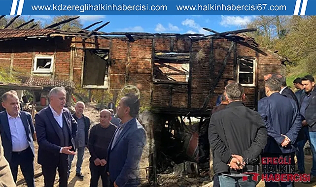 Saffet Bozkurt, evi yanan aileyi ziyaret etti...